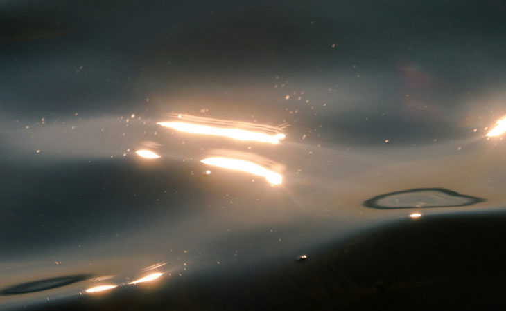 Detail of reflection of light on water